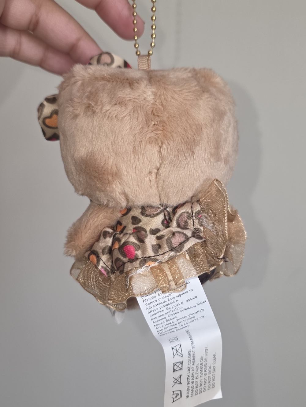 Sanrio Brown Hello Kitty Plush Keychain with Pink and Orange Hearts - Picture 2 of 2